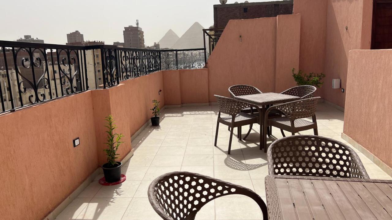 Pyramids Road Guest House Cozy Rooms And Rooftop Breakfast With The Pyramids View Nazlet el-Sisi Екстер'єр фото